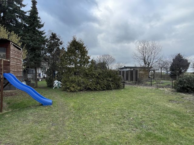 Grundstück kaufen in Mit Gartenhaus und Schuppen bebaute