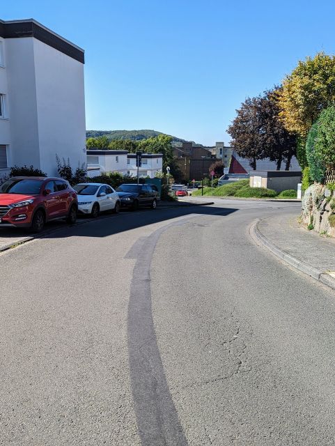 Blick in die Straße - Miteigentumsanteil in einer WEG-Anlage **Sondereigentum an einer Garage - nicht errichtet**