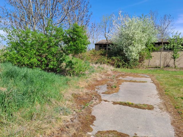 Blick auf Verkaufsfläche und Umgebung - Unbebautes Grundstück in Ortslage von Warmsdorf