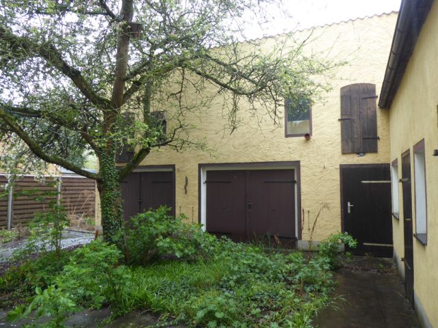 Nebengebäude West - Leerstehendes Wohn- und Geschäftshaus