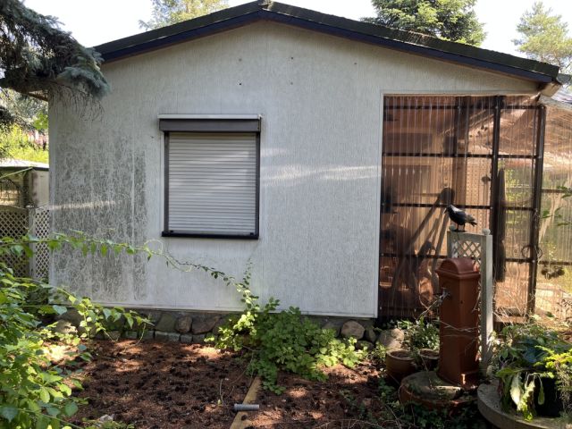 Giebelansicht Bungalow - Grundstück mit ehem. Bungalow, Schuppen & Carport ++in einem Wohn- und Erholungsgebiet im nordöstlichen Umland von Berlin++