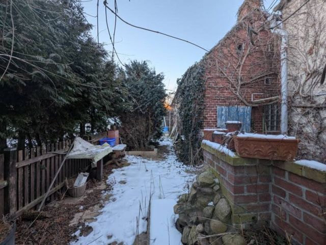 Garten mit Blick auf das Stallgebäude - Einfamilienhaus mit Anbau, Wintergarten & Nebengebäuden nördlich der Landeshauptstadt Magdeburg +ruhige Lage+